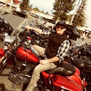 106.7 Z-Rock's morning man Tim Buc Moore on a motorcycle at Sierra Steel Harley Davidson in Chico California