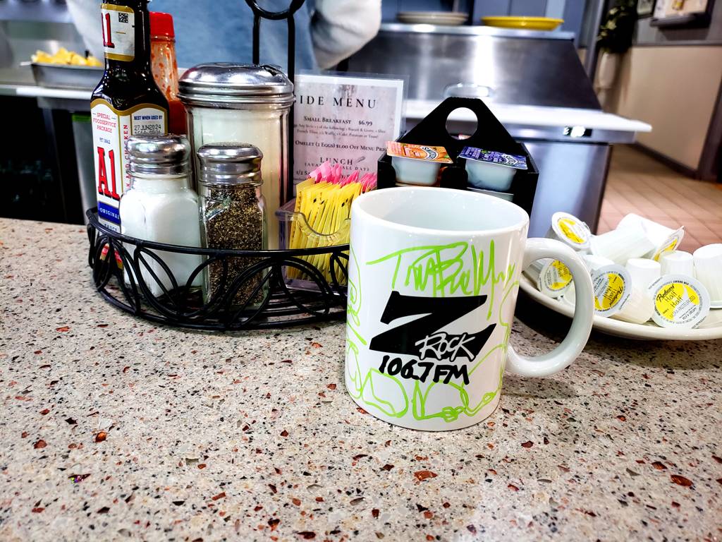 World famous Z-Rock "Doodle" mug customized by Tim Buc Moore at Cozy Diner in Paradise California for Wake the Buc Up on 106.7 Z-Rock April 21st 2022