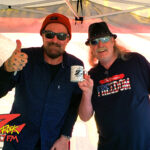 Tim Buc Moore with a loyal Buc Head at Betty Cakes & Coffee in Oroville California for Wake the Buc Up on 106.7 Z-Rock April 7th 2022