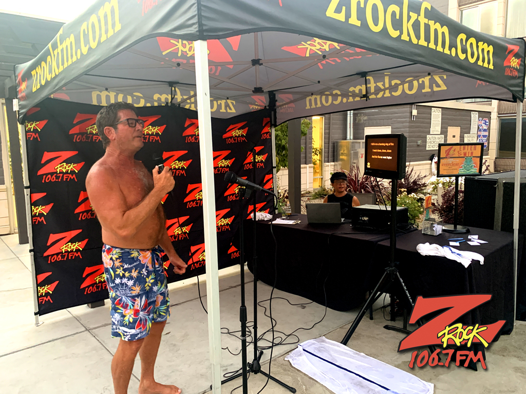 Z-Rocker sings 90s karaoke at the Doubletree by Hilton in Chico CA during 106.7 Z-Rock's 90s Karaoke pool party Friday August 19th 2022