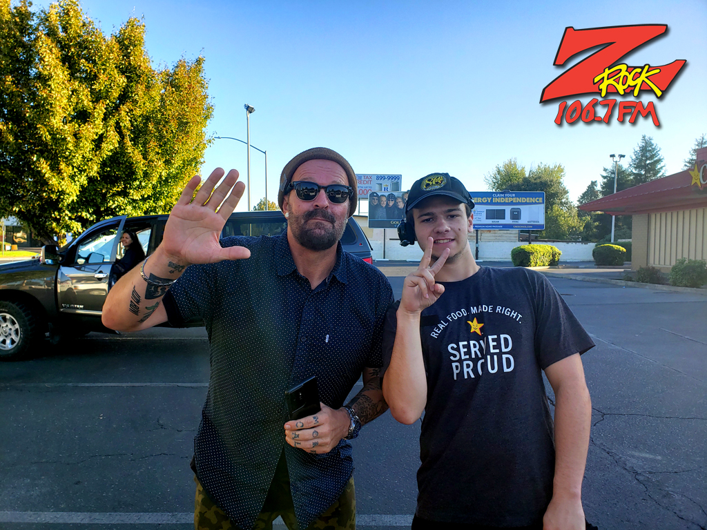 Tim Buc Moore with a loyal Buc Head at Carl's Jr. in Chico California for Wake the Buc Up on 106.7 Z-Rock October 21st 2022